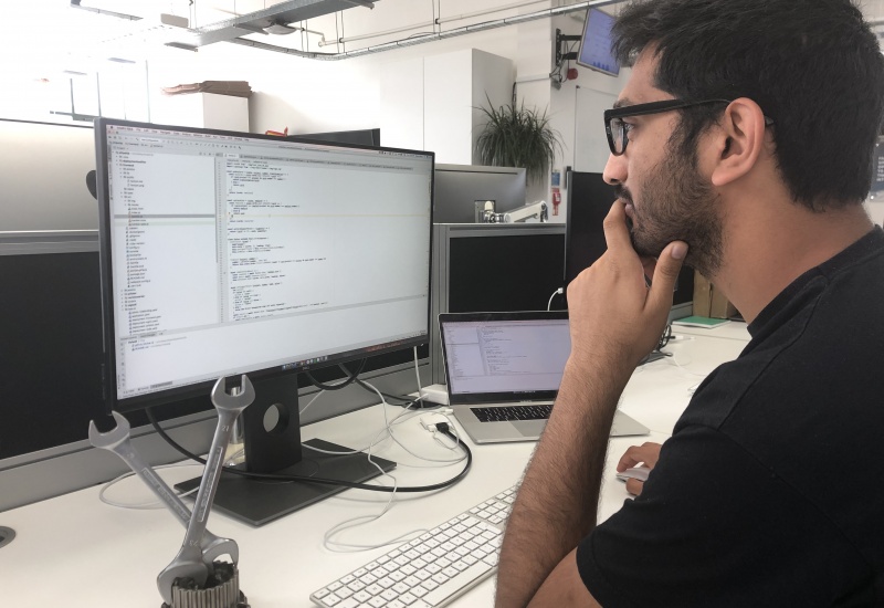Developer looking at screen.