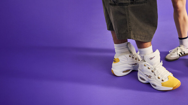 Close-up of vintage-style sneakers and streetwear.