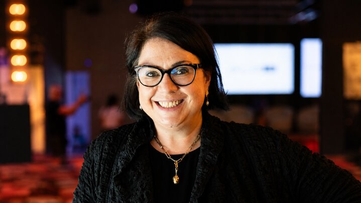 Eve Williams, VP and General Manager of eBay UK, smiles for a portrait at an eBay event.