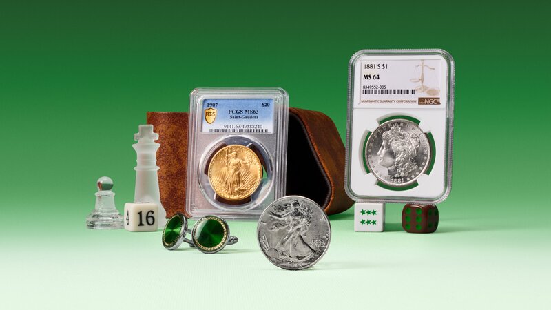 Graded U.S. collectible coins, including a 1907 Saint-Gaudens $20 gold coin and 1881-S Morgan silver dollar, displayed with a Walking Liberty half dollar and game pieces on a green background.